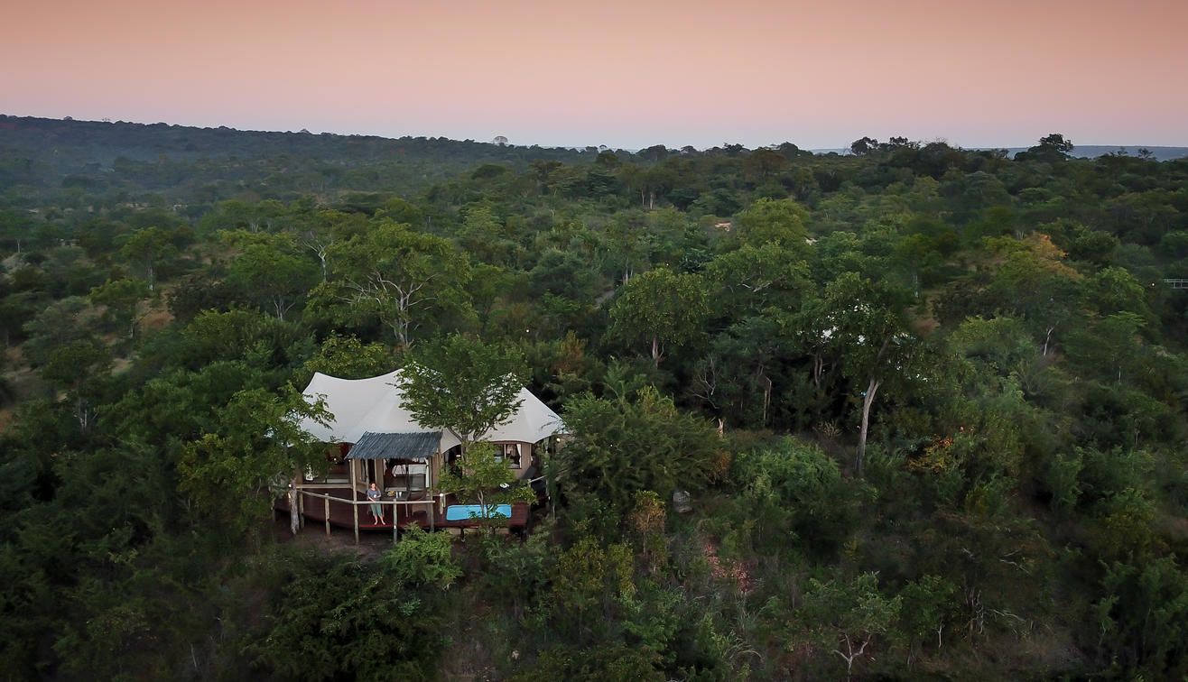 The beautiful Elephant Camp, hidden among the forests of Victoria Falls