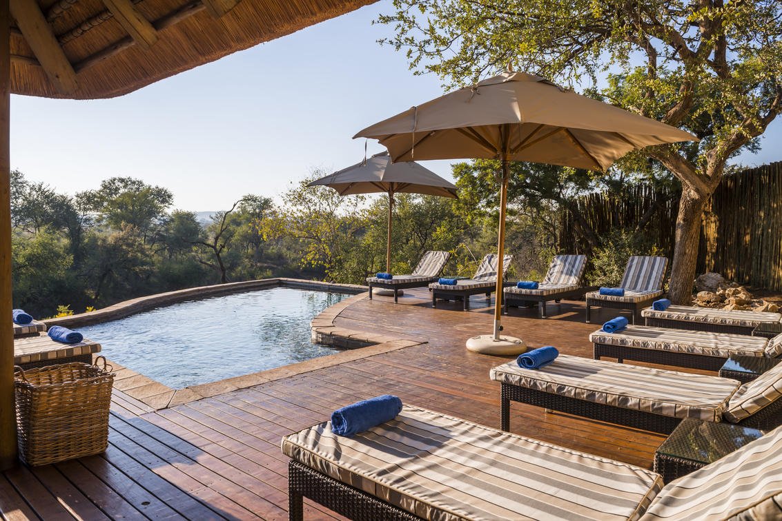 The pool deck at Thakadu River Lodge